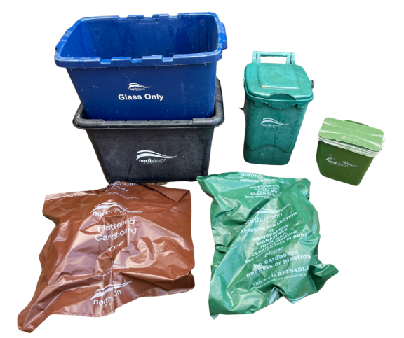 2 recycling boxes, 2 green bins and a brown waste bag and a green waste bag