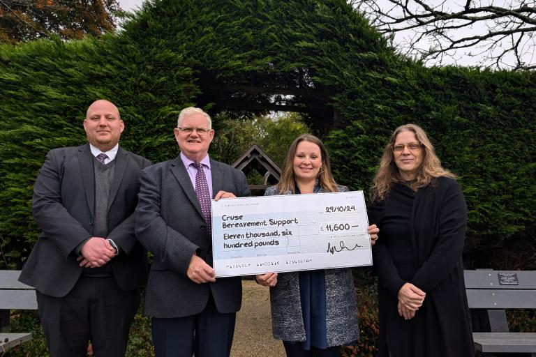 Picture shows Councillor Simon Inch and North Devon Crematorium staff members presenting a cheque to Lucy Fourie, Cruse Bereavement Support Devon Administrator.